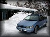 The resulting snowbanks are higher than the minivan!