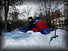 Snowbanks high enough to sled down in the front yard!