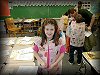 Kelsey showing her school project about Native Americans