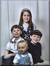 Kelsey, Tyler, Christopher and John pose for a portrait, a Mother's Day gift for Oma